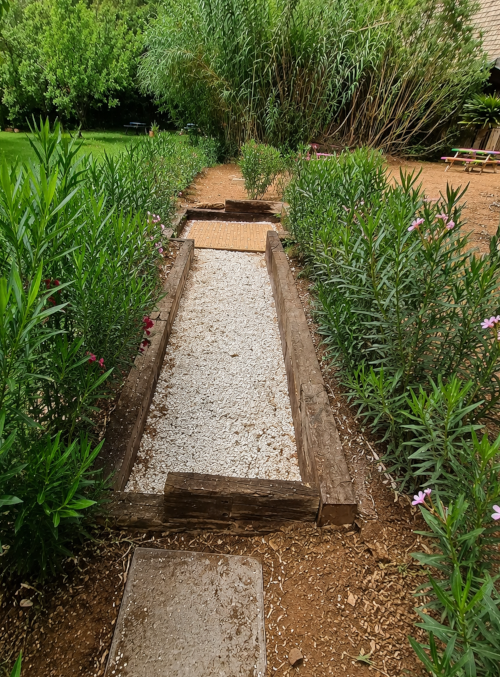 Sistema de tratamiento de agua integrado paisajísticamente con vegetación mediterránea - Proyecto HarmonyBio Ibiza